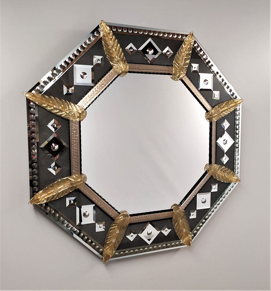 Elegant octagonal Murano glass mirror with gold leaf accents.